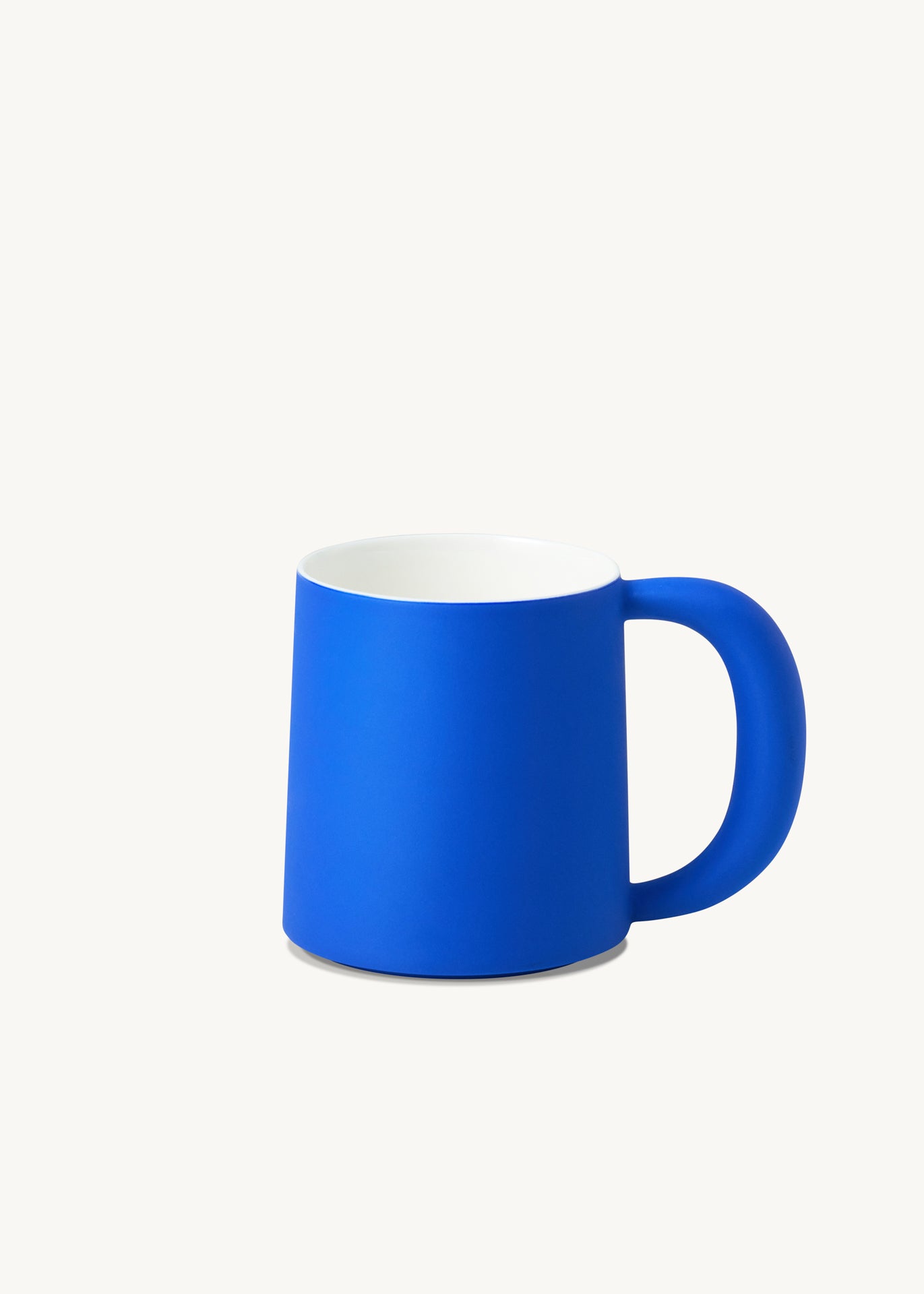 Blue ceramic utensil handcrafted with vibrant glaze