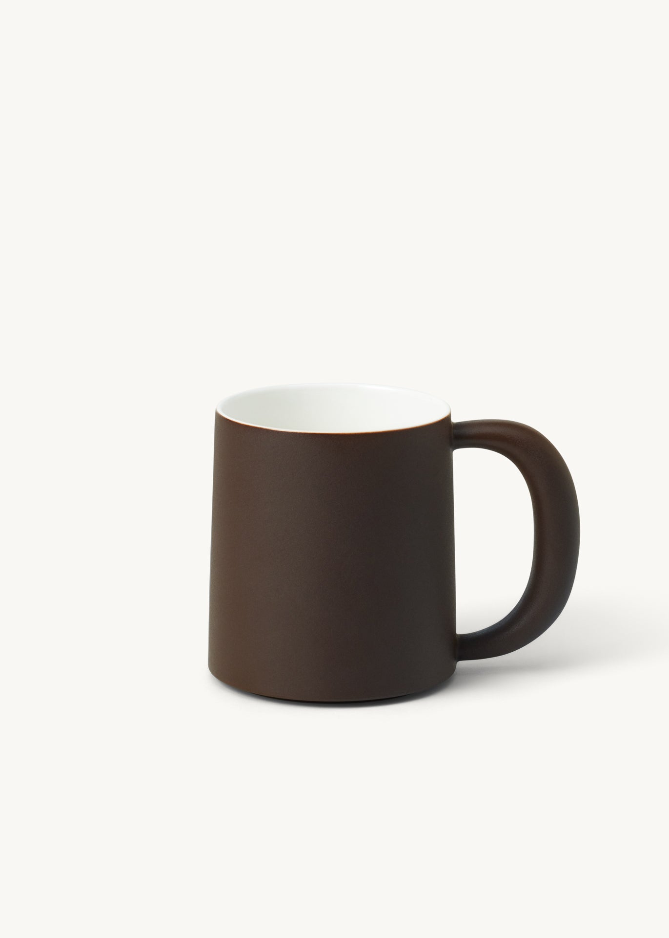 Brown ceramic utensil with warm rustic handcrafted finish
