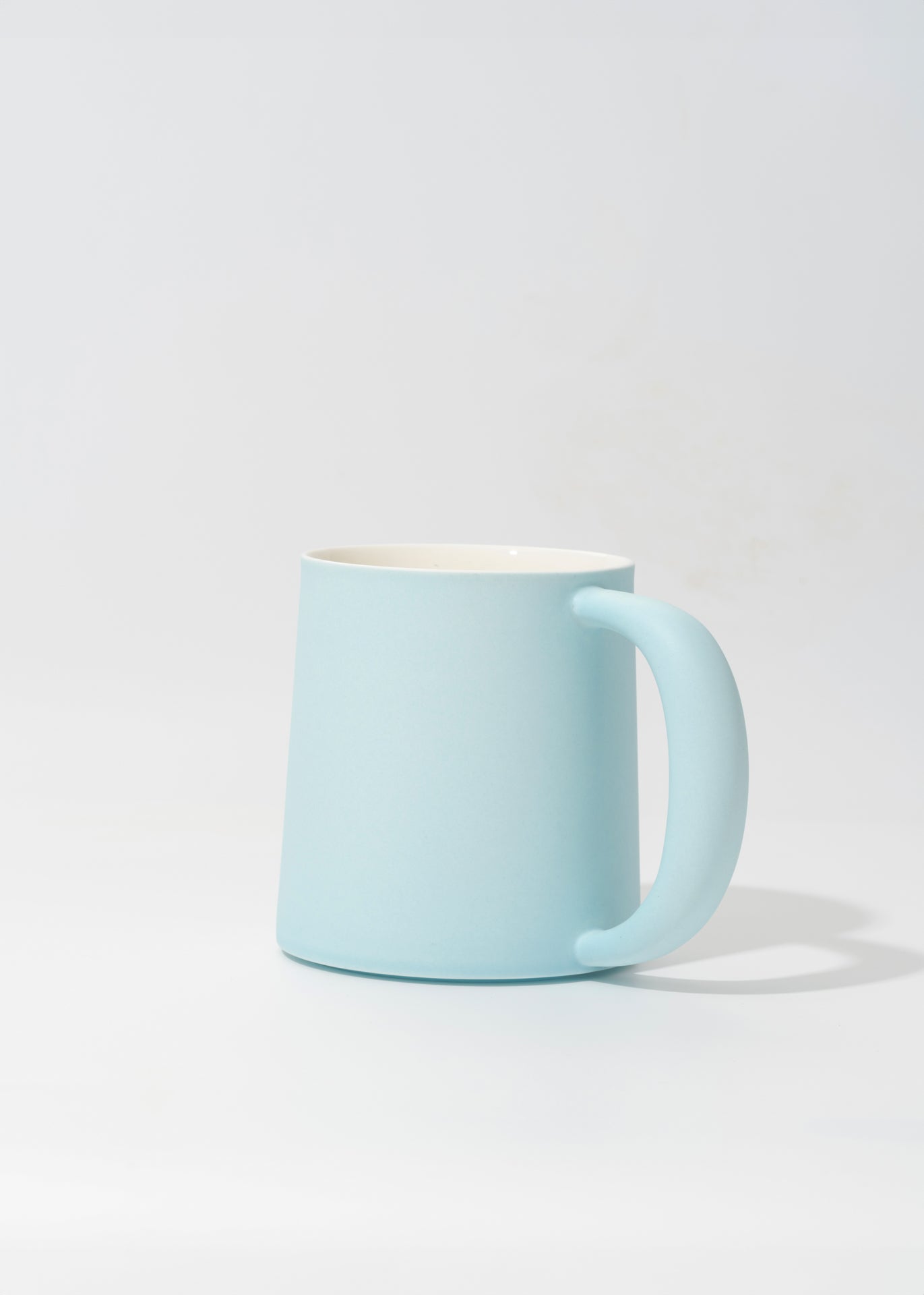 Powder Blue ceramic utensil with smooth handcrafted finish